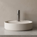 Robinet lavabo Solea gun metal sur une vasque à poser